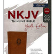 Load image into Gallery viewer, Personalized Custom Text Your Name NKJV Thinline Bible Youth Edition Leathersoft Brown Red Letter Edition Comfort Print
